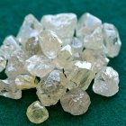 Uncut diamonds in the sorting room at De Beers' Diamond Trading